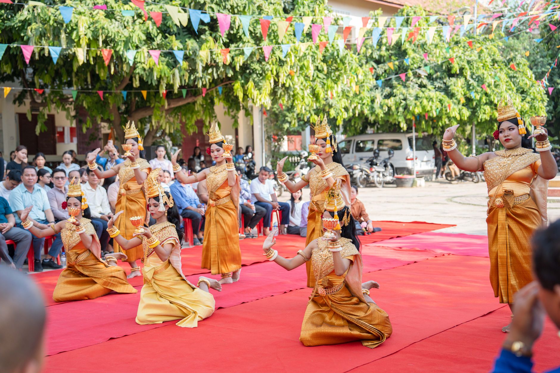 Dancers perform a traditional Khmer dance outdoors during a cultural event in Battambang, Cambodia.